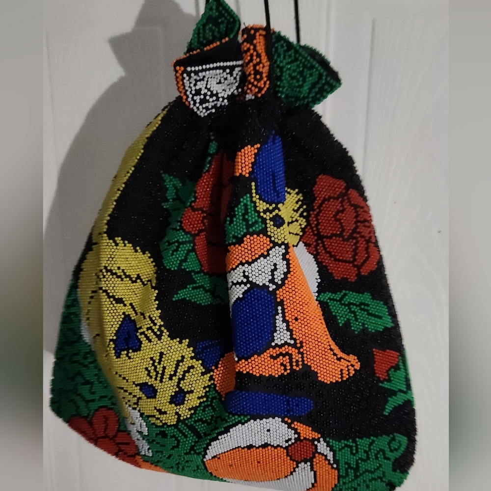 FULLY BEADED MED-LG DRAW STING BAG